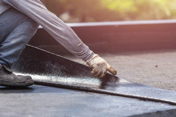 Professional Basement Waterproofing technician working in Central Islip, NY